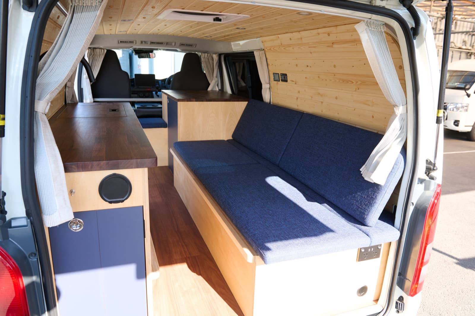 TAMA interior with bench seat and kitchen